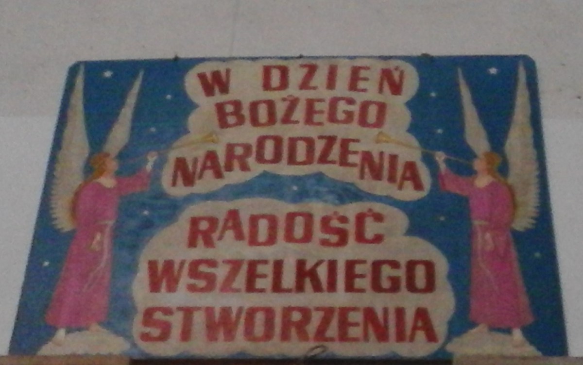 Aviso con dos ángeles